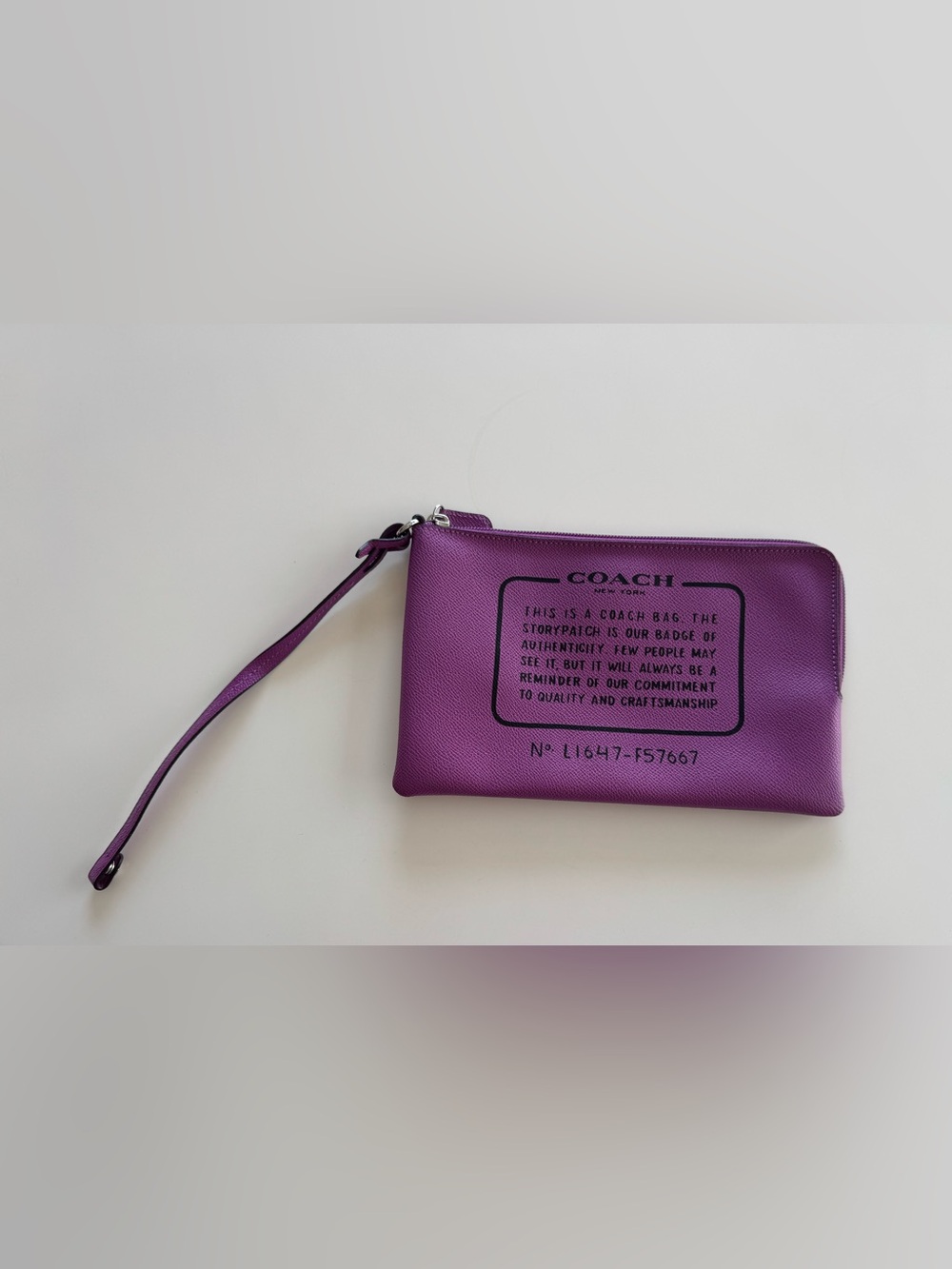 Coach Purple Leather Wristlet with Logo Stamp